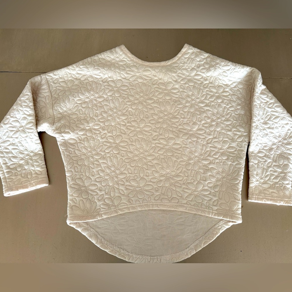 Cropped and quilted sweatshop